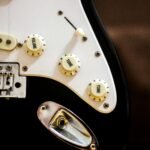 Electric guitar connection point